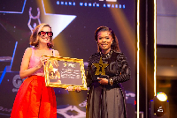 Deloris Frimpong Manso, popularly known as Delay [R] receiving her award