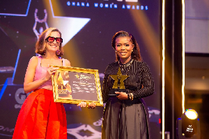 Deloris Frimpong Manso, popularly known as Delay [R] receiving her award