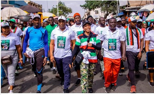 Dr Zanetor Agyeman-Rawlings and some youth in her community