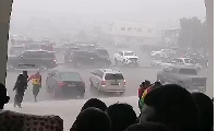 The unexpected downpour swept through the funeral grounds in Koforidua in the Eastern Region