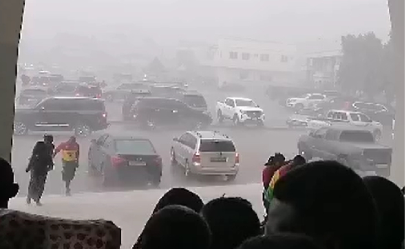 The unexpected downpour swept through the funeral grounds in Koforidua in the Eastern Region