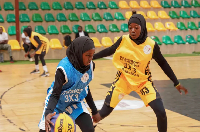 Girls take part in a grassroots basketball training session for young female players