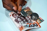 Ghana's cedi weakens into historic decline versus the US Dollar - Bloomberg