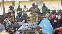 The Kenya Wildlife Service meets with local residents to address human-wildlife conflict in Kajiado