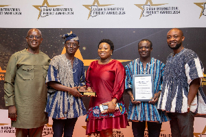 Representatives of Regimanuel Concrete Products Ltd receiving the awards