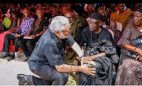 A picture of the late Jerry John Rawlings greeting a chief