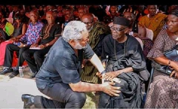 A picture of the late Jerry John Rawlings greeting a chief