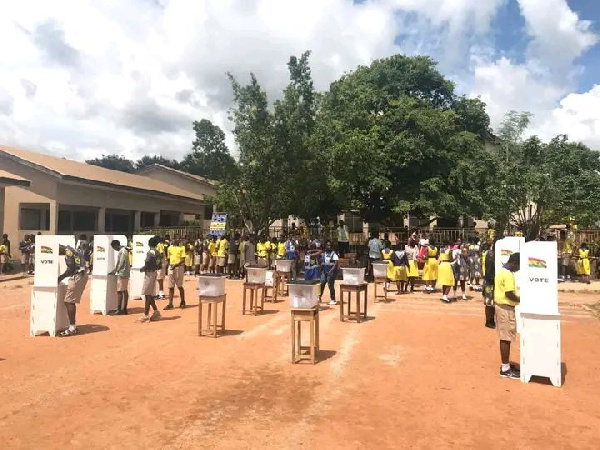 The students in the process of voting