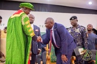 Otumfuo Osei Tutu II (left) shaking hands with Vice President Dr Mahamudu Bawumia