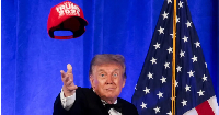 Trump revealed a Trump 2028 cap at the end of his remarks, making jokes about serving a third term