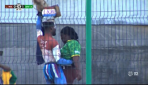 The two fans were seen dancing during the game