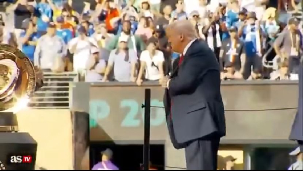 Trump was seen putting one of the medals inside his pocket