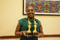 Georgina Asare Fiagbenu showcasing her awards