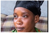 A photo of the distressed woman who lost her two children
