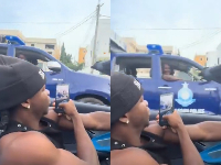 The video shows one of them, driving, and taking out his phone to record