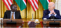 US President Joe Biden, right, and Kenya's President William Ruto, left, take part in an event