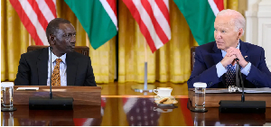US President Joe Biden, right, and Kenya's President William Ruto, left, take part in an event