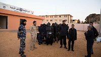 Immigrants gather at Mitiga gathering point of anti-immigration department in Tripoli