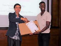 The Japanese Ambassador to Ghana presenting an award to one of the winners