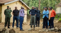 President Paul Kagame with government officials when they visited Rubavu in northwestern Rwanda