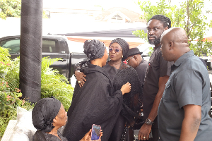 Dzifa Gomashie is seen here commiserating with the widow of the late Daddy Lumba