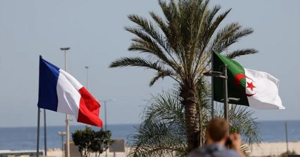 France and Algeria's national flags seen flying ahead of French President Emmanuel Macron's official