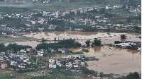 Village roads and farmlands are submerged in water after heavy rains in Qingyuan city