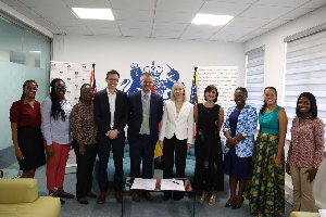 Some UK, US and Ghana officials in a group photograph