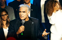 Yair Lapid speaks at a party event in Tel Aviv