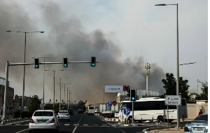 Plume of smoke rising from a reported Iranian strike in the industrial district of Doha on March 1