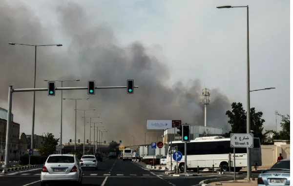 Plume of smoke rising from a reported Iranian strike in the industrial district of Doha on March 1