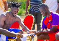Onana (L) with the President of Burkina Faso, Captain Traore (R)