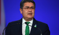 Juan Orlando Hernández presents his national statement during day two of COP26 in Nov. 2021