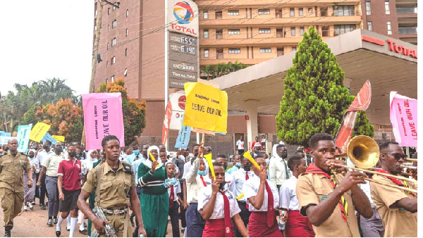 Students in Kampala, Uganda march to the EU mission offices to deliver a petition