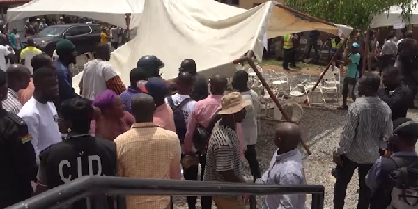 The supporters dismantled canopies, chairs, and a voting booth set up for the event