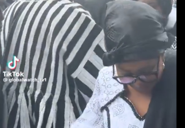 Lordina Mahama walking towards her vehicle