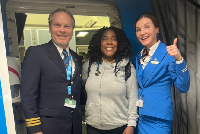 Dr. Addo Klah (middle) with Crew Captain Romkens and an airhostess