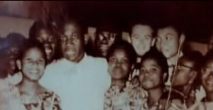 Kwame Nkrumah in a photo with some students from Achimota School including a young JJ Rawlings