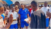 Ghanaian musician cum actor, LilWin donating to a prison in Kumasi