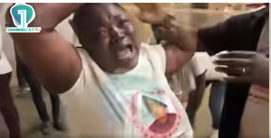 A picture of the supposed mother of Nana Agyei captured wailing