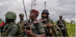 M23 rebels in Kibumba, a key highway in eastern DR Congo