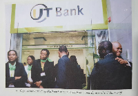 An old photo of Capt Kofi Amoabeng (far right with back turned) with some of his workers