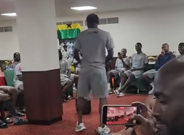 Kohn dancing in front of his teammates
