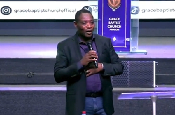Business mogul Daniel Ofori preaching in a church