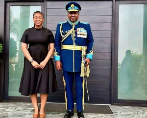 Mariam Aziz standing together with President Mahama