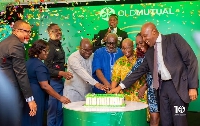 Some management executives, board members and dignitaries cutting the 10th anniversary launch cake