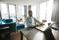 A file photo of a man working remotely