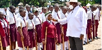 President Museveni interacts with some of the students during the pass-out