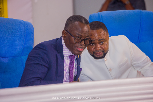 Justice Yonny Kulendi with Wonder Kutor during the book launch