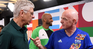 Arsene Wenger (in shades) has hailed FIFA boss Infantino